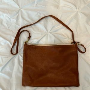 Clare V Flat Clutch with Tabs, Camel Color.